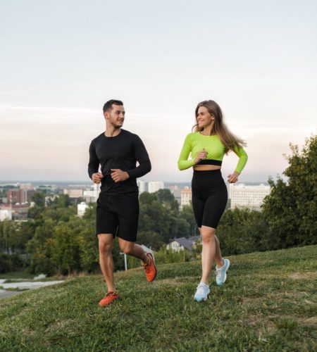 couple-running-outdoors-sunset-staying-active-fit (1)